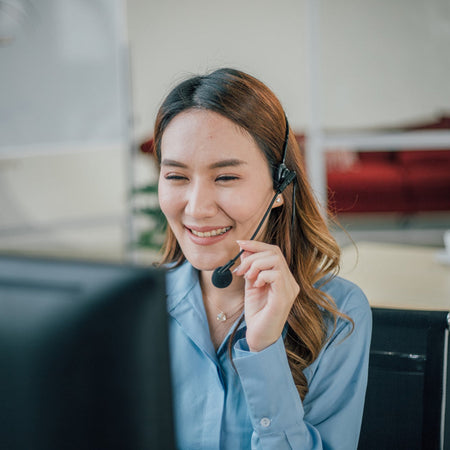 Woman wearing a headset in an office setting